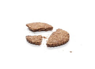 Integral oatmeal cookie with chocolate isolated on white background