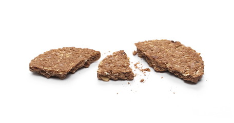 Integral oatmeal cookie with chocolate isolated on white background
