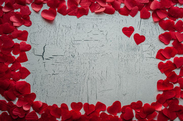 Valentines Day background with red hearts. Copy space, top view, close-up.