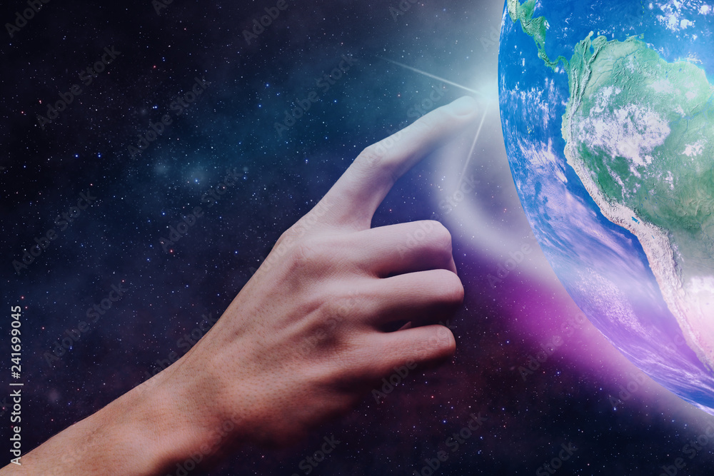 Leinwandbilder touching planet with finger. nebula dust in infinite space. mixed media.