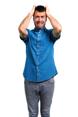 Fototapeta premium Handsome man with blue shirt unhappy and frustrated with something. Negative facial expression