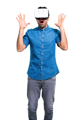 Handsome man with blue shirt using VR glasses