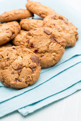 Chocolate oatmeal cookies on the  wooden background.