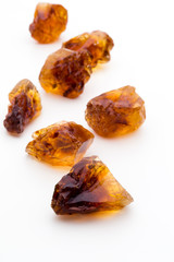 Brown caramelized sugar on white background.