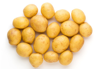 New potato and rosemarin isolated on white background close up.