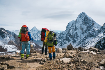 Fototapeta na wymiar Three backpackers in the Himalayas