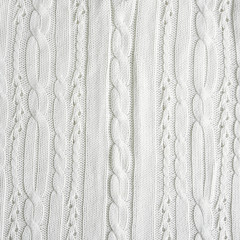 White ivory Knitted Fabric Texture. Handmade sweater texture,background, copy space.