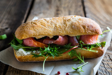Big sandwich with salmon and cream cheese