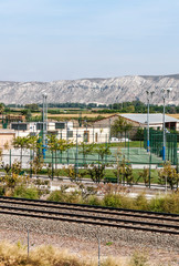 Fototapeta na wymiar Utebo train tracks with mountains in the background