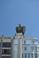 Beautiful Sculpture of an Imperial Eagle dedicated to Emperor Cesar Augusto in Santo Domingo Square in Lugo. Travel, Architecture, Holidays. August 3, 2015. Lugo Galicia Spain.