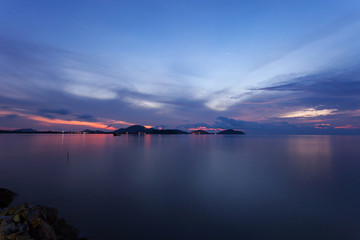 Long exposure image of dramatic sunset or sunrise,sky clouds over tropical sea.