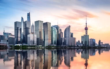 Fotobehang Shanghai skyline van shanghai bij zonsondergang