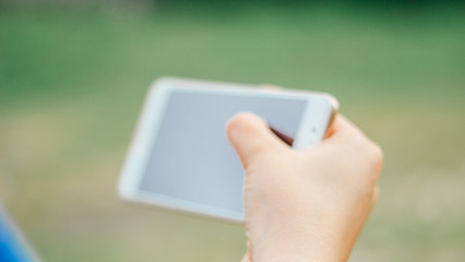 woman with smartphone close up