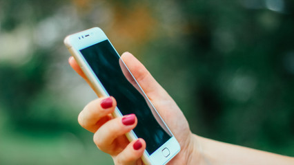 woman with smartphone close up