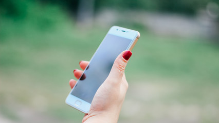 woman with smartphone close up