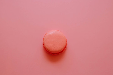 Macaroon coral color on a pink background.