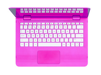 Open pink laptop with english keyboard, top view