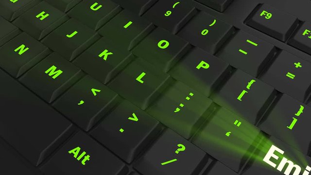 pointing the camera on green glowing Emigrate key on black computer keyboard