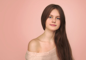 Fototapeta premium blue eyed brown haired shy girl with flowing hair