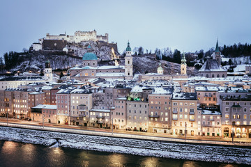 Fototapeta premium Salzburg old city at christmas time, snowy in the evening, Austria