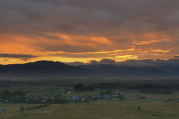 Fototapeta na wymiar Sunrise with twilight from Nan province, Thailand. Sky, mountain soft and blur background.