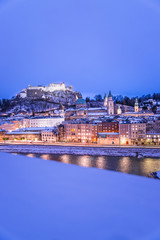 Fototapeta na wymiar Salzburg old city at christmas time, snowy in the evening, Austria