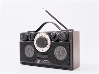 retro black radio receiver with antenna and speakers