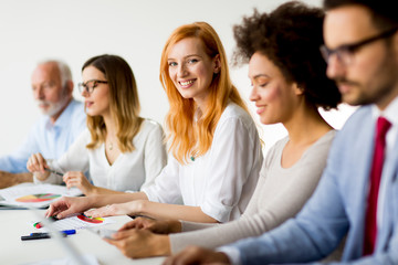 Businesspeople sitting  in conference room during meeting at office