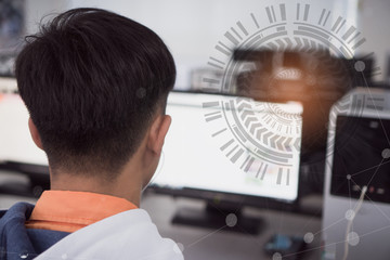 BIG DATA / Internet of things (IoT) concept, Businessman or student using computer with graphical and digital interface artificial intelligence screen presented symbol connected icons over technology