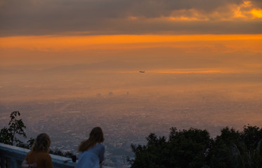 City view, orange light in the morning with fog