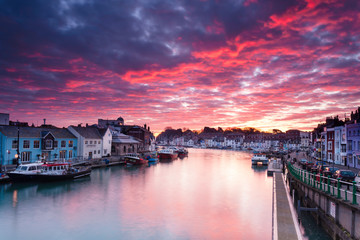 Weymouth Harbour Dorset early Morning with Lifeboat and tall ships
