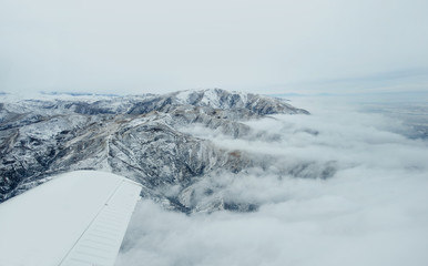 aerial view of clouds  over city from airplane