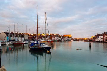 Fototapeta na wymiar Weymouth Harbour Dorset in spring with boats
