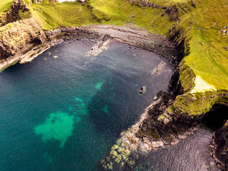 Aerial view of the Dinosaur bay with the rare Dinosaur footprint of the sauropod-dominated tracksite from Rubha nam Brathairean, Brothers Point - Isle of Skye, Scotland © Lukassek