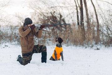 good hunter stalks his prey with care. full length photo