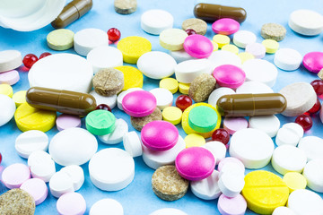 pills on a blue background