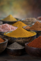 Aromatic spices on wooden background