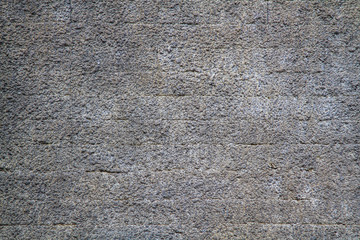 Gray concrete stucco wall textured with pattern