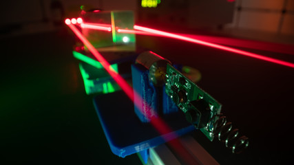 Experiment with red laser in optics lab