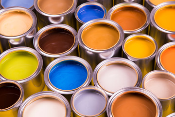 Brush, metal cans with color paint