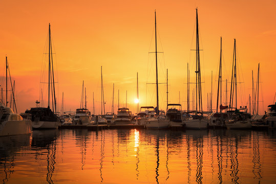 View of Harbor and marina with moored yachts and motorboats in pattaya thailand - Powered by Adobe