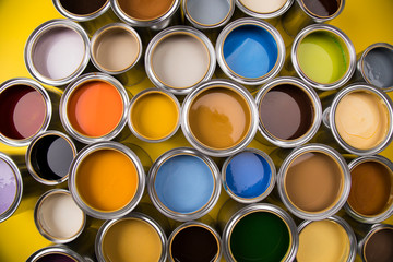 Fototapeta premium Paint cans color palette, yellow background
