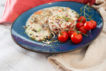 risotto with fresh cream, salted chicken, rehydrated ceps and mushrooms
