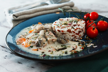 risotto with fresh cream, salted chicken, rehydrated ceps and mushrooms