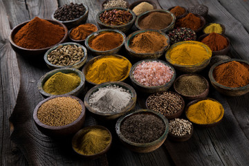 Aromatic spices on wooden background