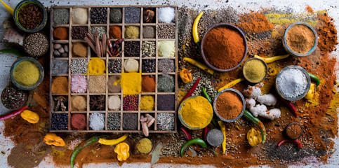 Hot spices in wooden bowls