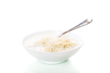 homemade sweet noodles with milk in a plate