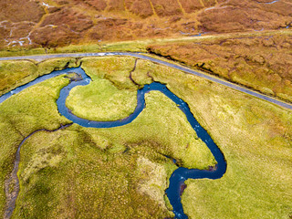Aerial view of the River Lealt and Single track at Loch Cuithir and Sgurr a Mhadaidh Ruadh - Hill of the Red Fox, Isle of Skye, Scotland