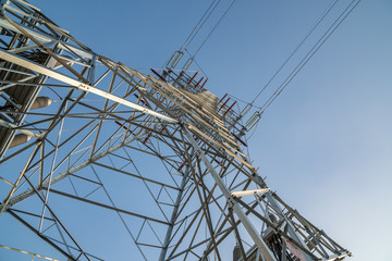 power transmission tower on background of blue sky