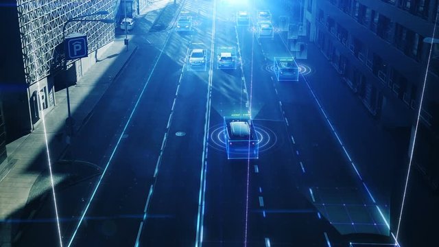 Aerial Drone Shot: Autonomous Self Driving Cars Moving Through City. Concept: Artificial Intelligence Scans Cars and Pedestrians, Following Movement and Showing Data.